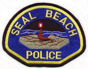 Seal Beach Police patch with a lighthouse and ocean design.